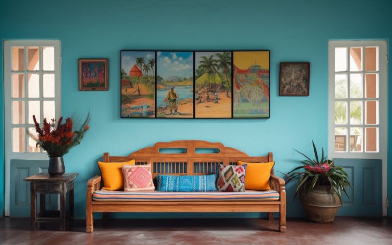 A cozy blue room with a wooden bench adorned with vibrant pillows.