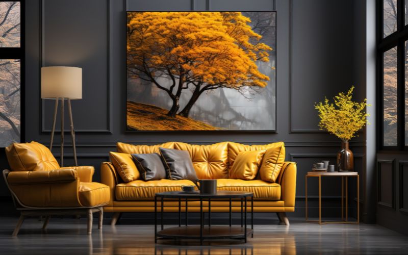 Interior with yellow furniture and tree artwork.